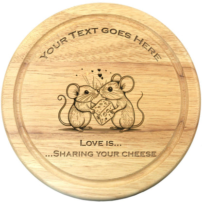 The Cathcart Elliot Mouse themed Personalised Cheeseboard Gift Set is crafted from sustainable rubberwood and engraved with two mice, cheese, hearts, and customizable text: Your Text Goes Here and Love is... Sharing your cheese. An ideal gift for any cheese lover.