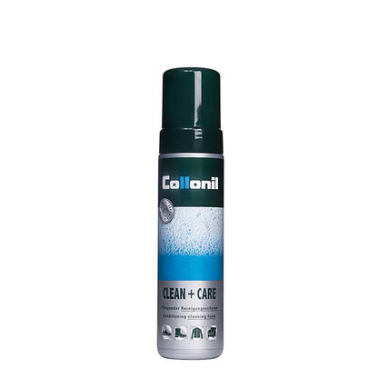 A bottle of Collonil Clean & Care Foam, an eco-friendly cleaner with a dark green cap, has a label with bubbles and icons for use on shoes and bags.