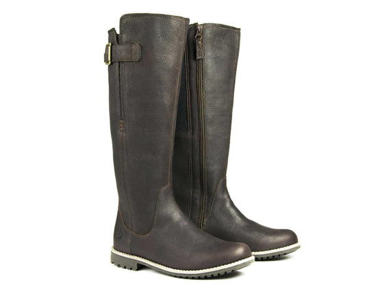 Check out the SALE Ladies Moreton Tall Boot in Dark Leather by Orca Bay. These boots feature side buckles, zippers, and sturdy soles, showcasing both front and side views beautifully.