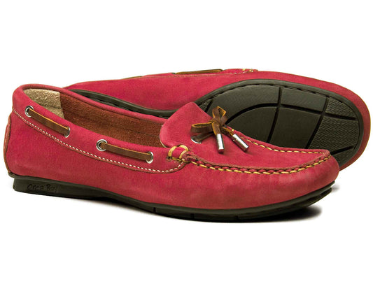 The Orca Bay BALLENA Womens Berry loafers feature a red moccasin style with brown leather laces and detailed stitching. Perfect suede driving shoes, they are washable with a non-slip rubber sole and textured black finish, contrasting the vibrant berry color.