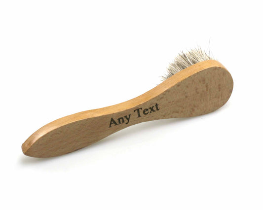 Engraved shoe polish applicator brush