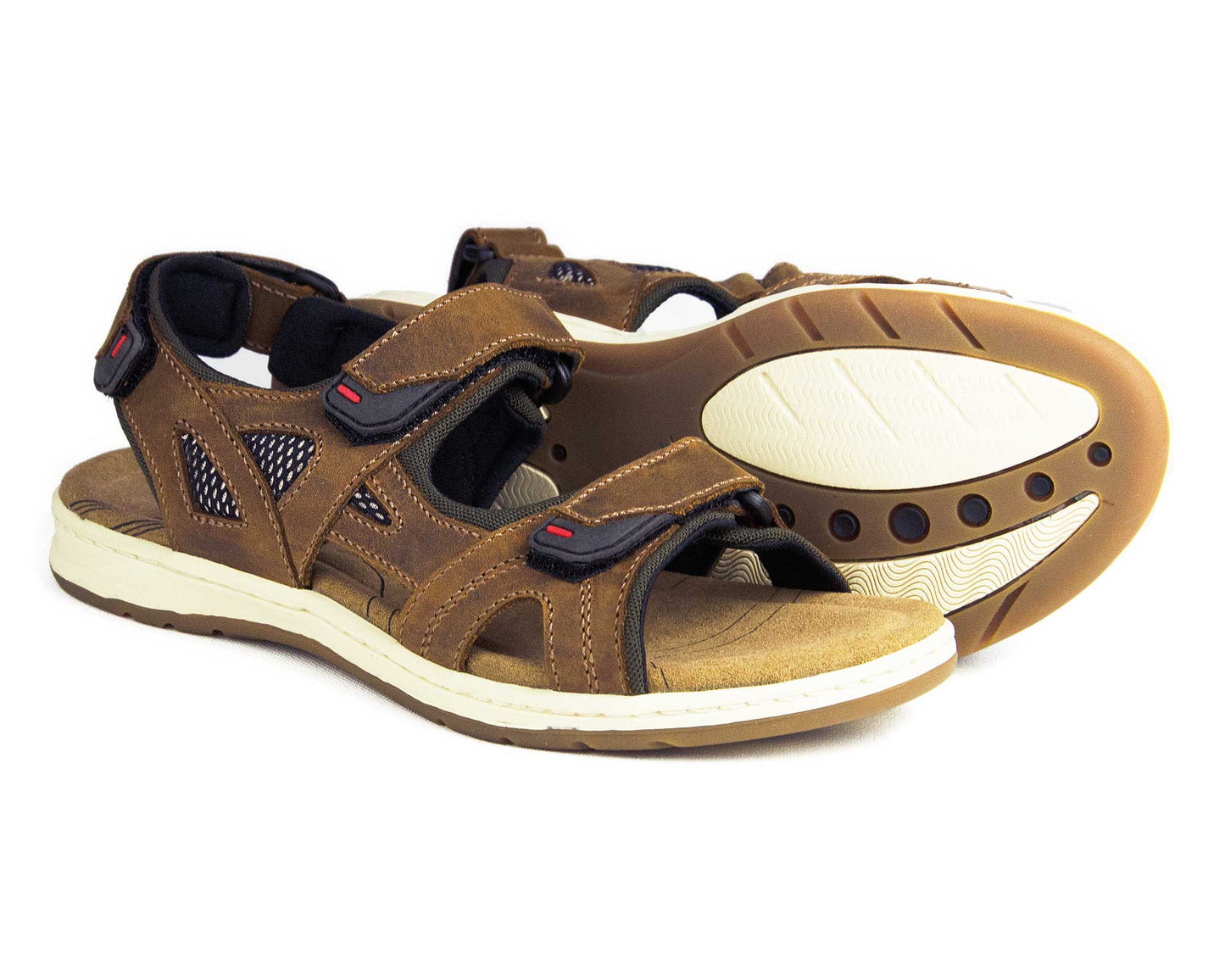 Orca Bays SALE SEYCHELLES Slim Fit Ladies Sandals in Sand nubuck feature a pair of open-toe sandals with adjustable Velcro straps, a cushioned insole, and textured rubber outsole for grip. Displayed with one upright and the other on its side to show the sole.