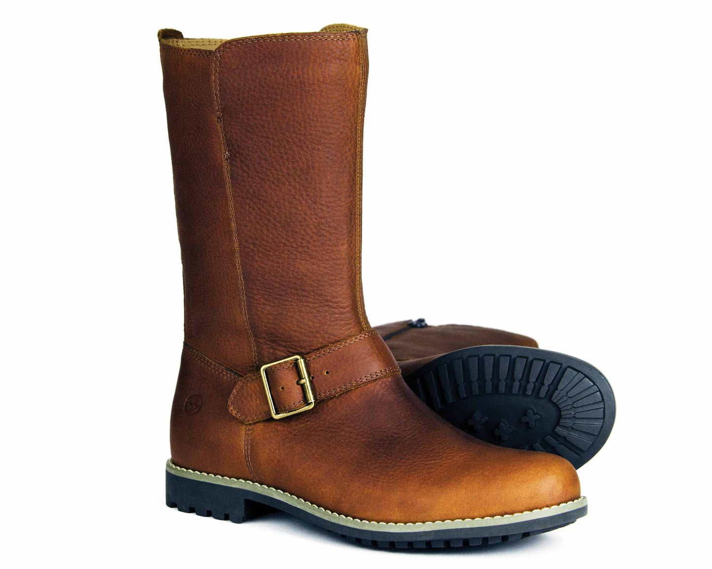 The SALE STOW Ladies Havana Leather Boot by Orca Bay features a waxy leather design with buckle detail, rugged sole, and mid-calf height. One boot is upright while the other showcases its tread pattern, combining style and durability for any adventure.